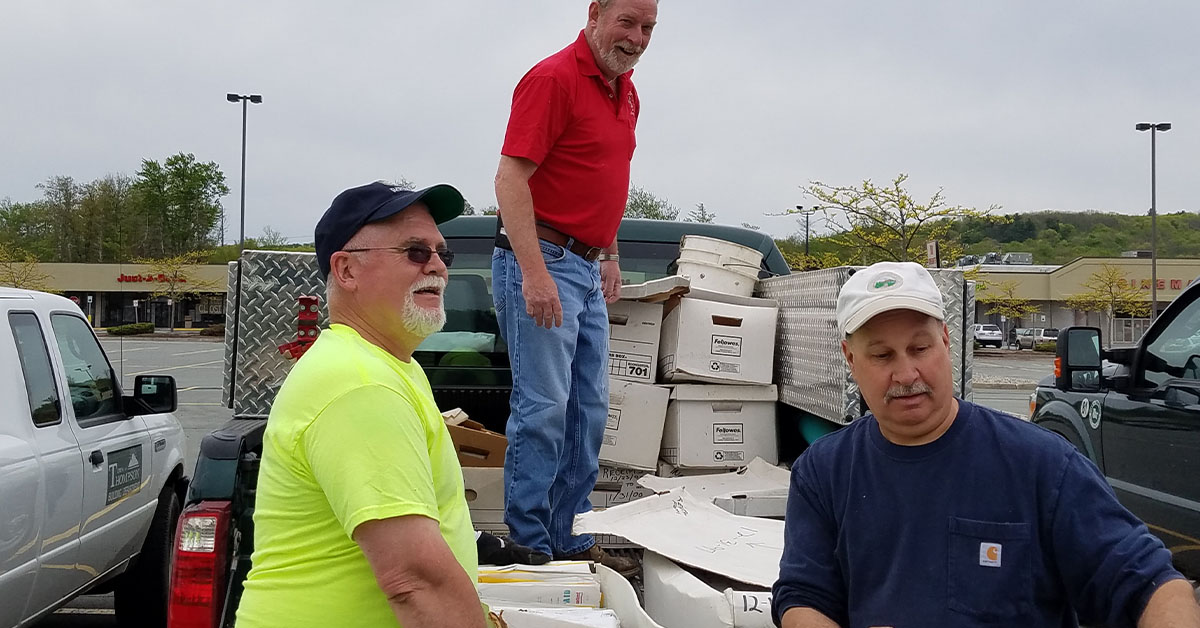 Sorting through boxes at the Town of Thompson Shred Day.